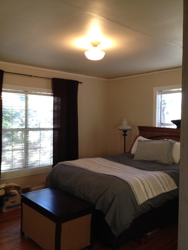 not a great "before" picture - it just looks boring here, when we took it down, it was filthy, and cleaning it would not have improved the style or the pattern etched in glass